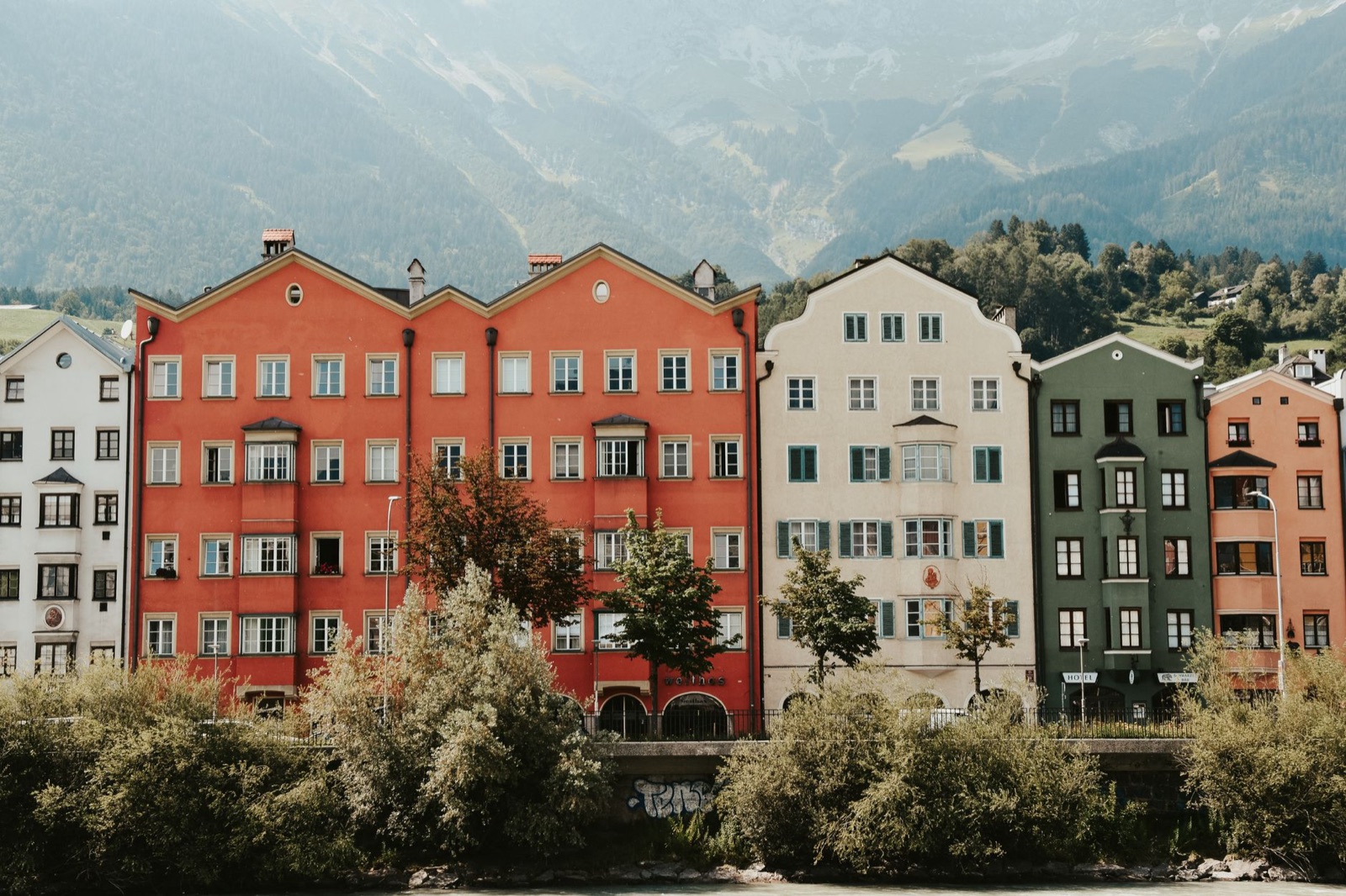 Colourful row of houses on the river Inn in Innsbruck, where our sixth salon opens